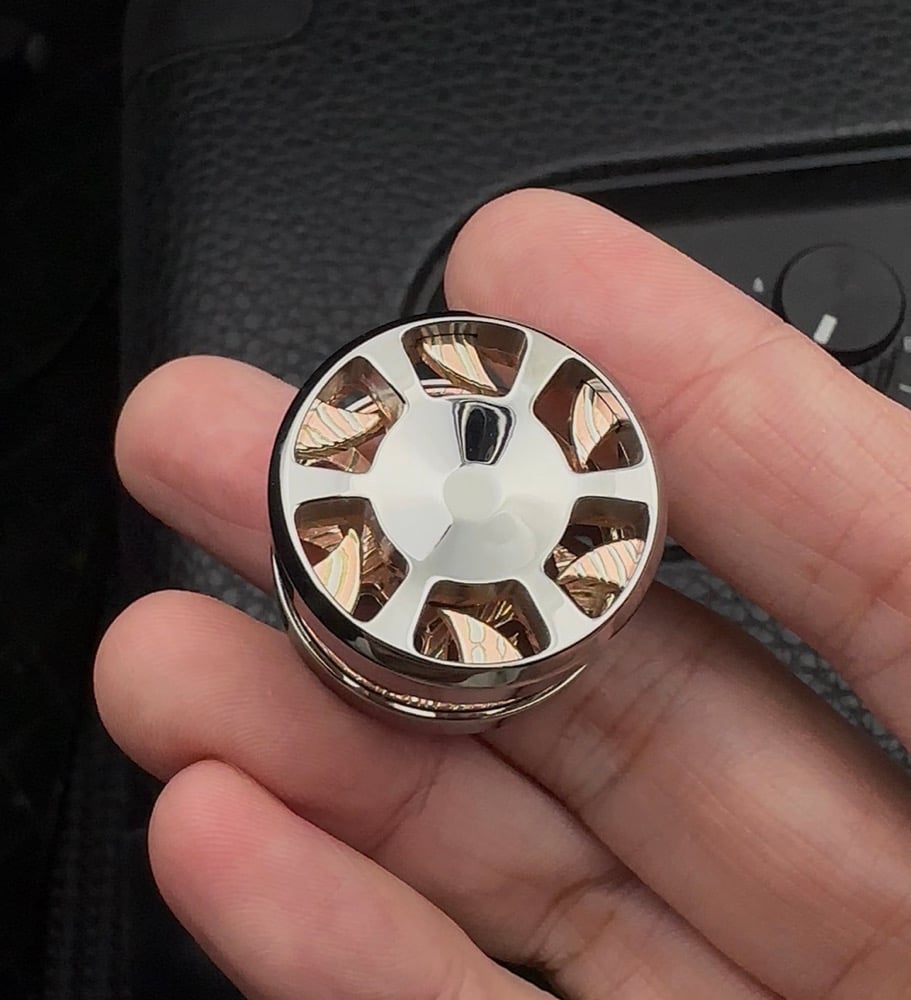 Image of Whirl Button