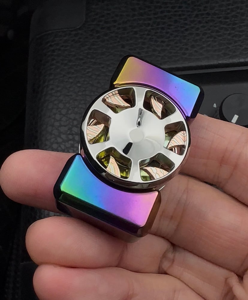 Image of Whirl Button
